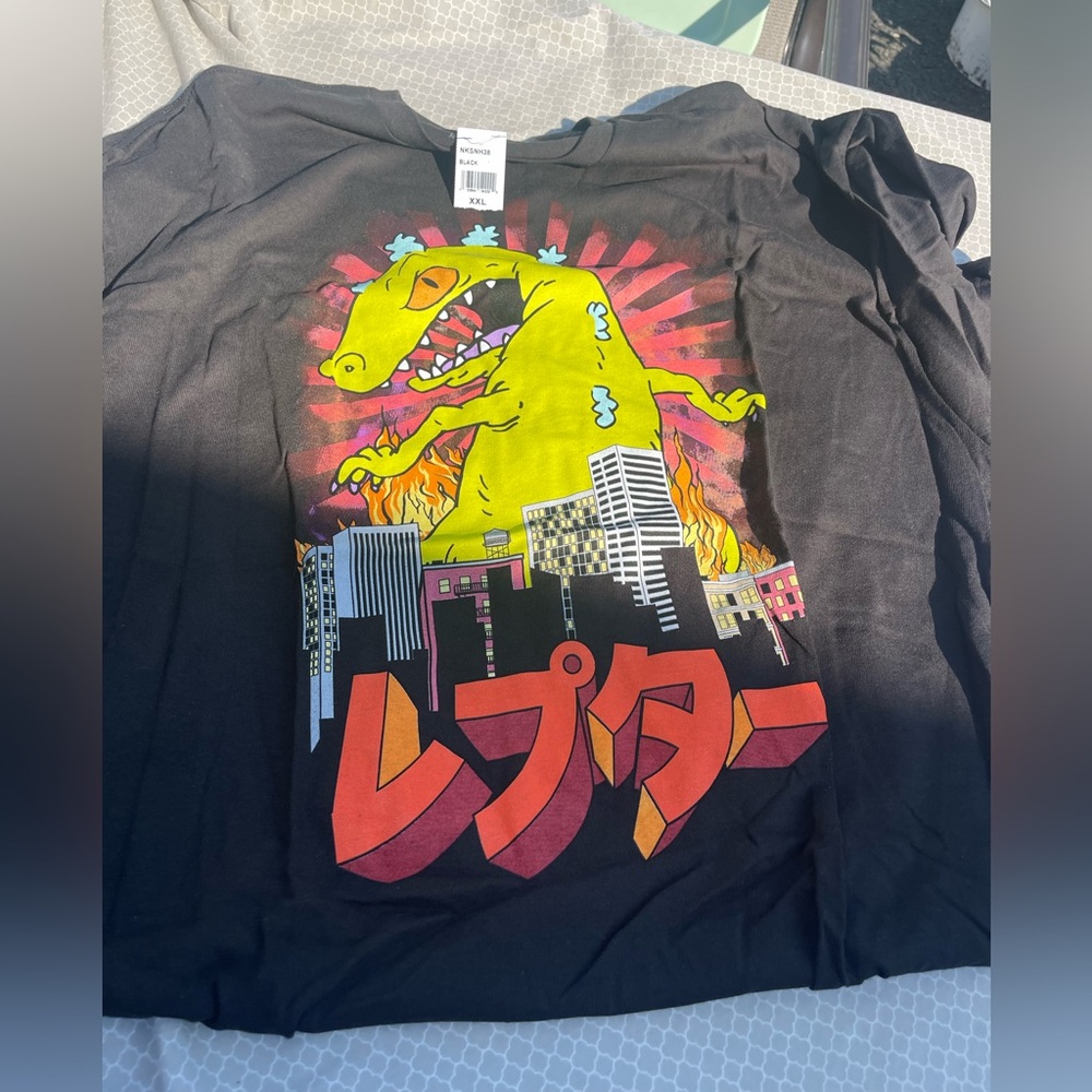 Nickelodeon Black Tee with Dinosaur Graphic
